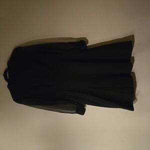 Stunning vintage black dress with absolutely beautiful sheer sleeves.  Size 16